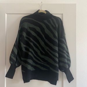 Black and green zebra print cowl neck sweater with bell sleeves